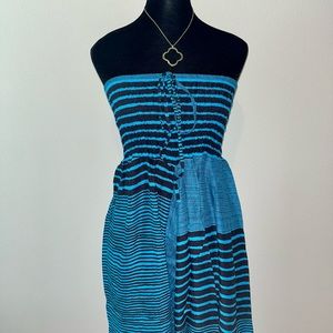OurWellnessSerenity strapless romper/harem pants with blue and black stripes.